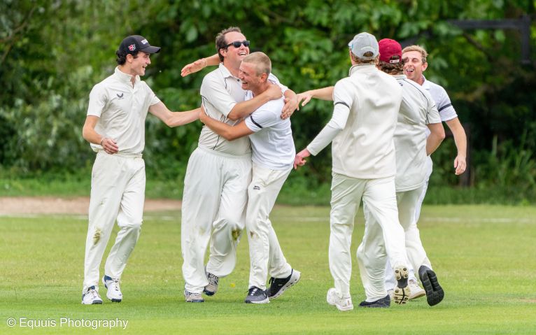 Charity cricket match players.